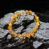 焦黄鸩羽圆珠手串