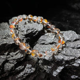 锦鲤鸩羽圆珠手串